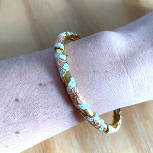 Vintage gold tone pink  and white butterfly bangle bracelet